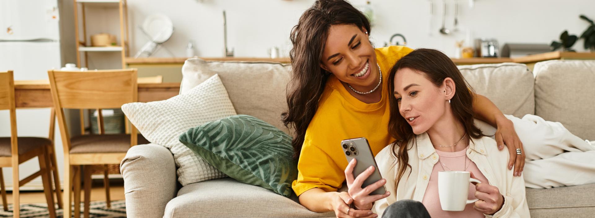 Women checking benefit eligibility on phone