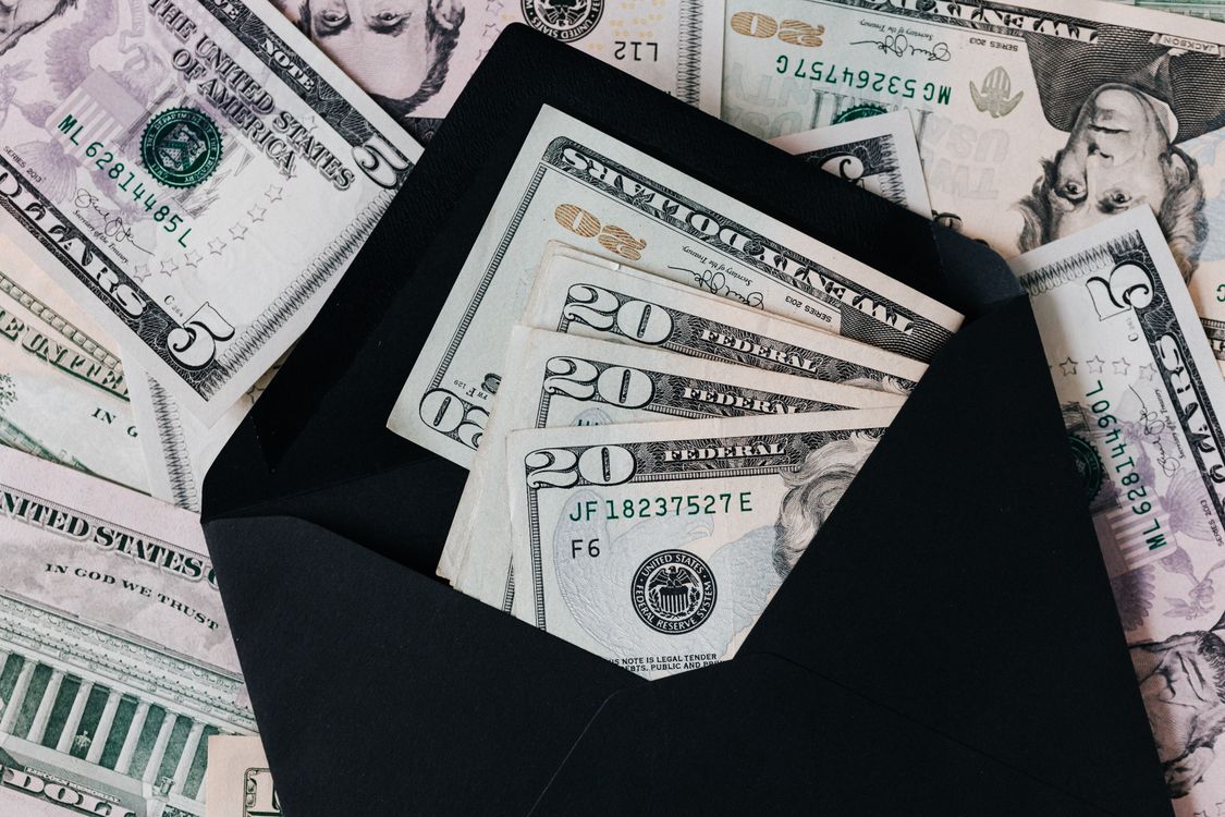 unclaimed money from the government financial documents on desk